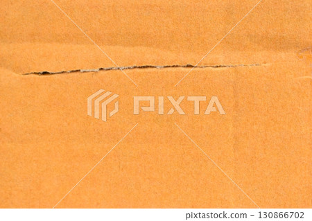 tear brown cardboard box texture background, recycle material 130866702