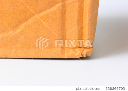 wrinkle brown cardboard box texture isolated on white background 130866703