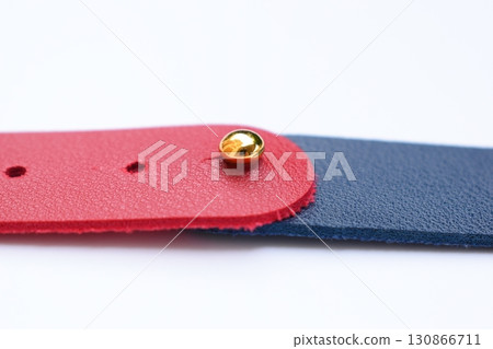 dark blue and red leather strap isolated on white background 130866711