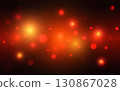 Fiery Orange Red Bokeh Light Background with Dark Glow. Burning Abstract Sparkle for Energy  130867028