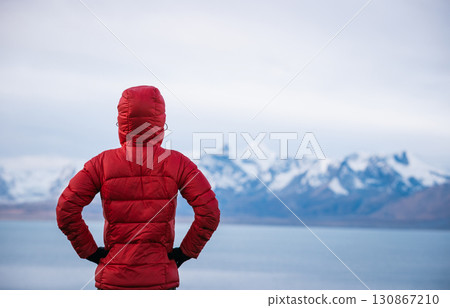 Backpacking woman hiking on high altitude mountain top Backpacking woman hiking on high altitude mountain top 130867210
