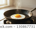Fried eggs in the morning sunlight 130867731