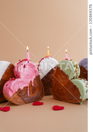 Birthday alternative cake candy greeting card Delicious fresh croissant topped with colorful flavor Ganache. Creation unique heart shape bakery. Puff pastry holiday love gift present idea Birthday alternative cake candy greeting card Delicious fresh croissant topped with colorful flavor Ganache. Creation unique heart shape bakery. Puff pastry holiday love gift present idea 130869376