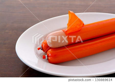 Fish sausage on the table background 130869614