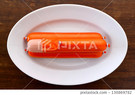 Fish sausage on a table background viewed from directly above 130869782