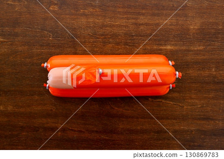 Fish sausage on a table background viewed from directly above Fish sausage on a table background viewed from directly above 130869783