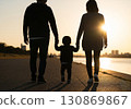 (AI-generated) Family image: Silhouette of a parent and child taking a walk in the setting sun 130869867