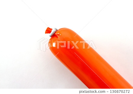 Fish sausage on white background 130870272