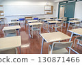 Image of desks and chairs seen from the back of an empty classroom, school, classroom 130871466