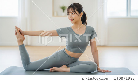 Woman doing yoga exercises 130871983
