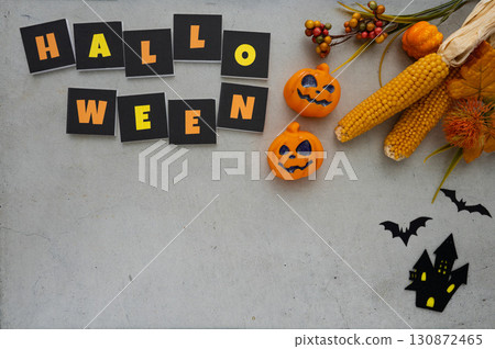 Halloween decorations on a concrete background Halloween decorations on a concrete background 130872465