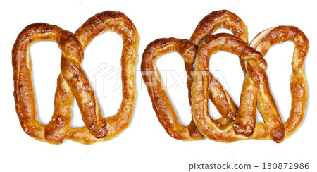 Salty baked brown pretzel isolated over a white background. Oktoberfest festival Salty baked brown pretzel isolated over a white background. Oktoberfest festival 130872986