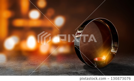 Sieve or strainer with a diya oil lamp for Karwa Chauth festival celebration on blurred bokeh light background. Celebrating love and devotion Sieve or strainer with a diya oil lamp for Karwa Chauth festival celebration on blurred bokeh light background. Celebrating love and devotion 130873076