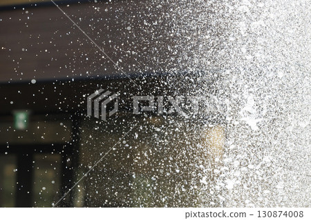 Slow motion image of the moment when the spray floats in the air Slow motion image of the moment when the spray floats in the air 130874008