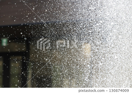 Slow motion image of the moment when the spray floats in the air Slow motion image of the moment when the spray floats in the air 130874009