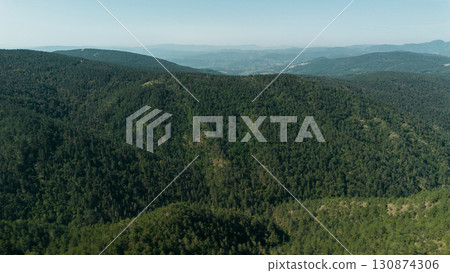 Aerial view of green mountain ridges and forested valleys in Divcibare, Serbia 130874306