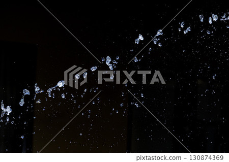 Slow motion image of the moment when the spray floats in the air 130874369