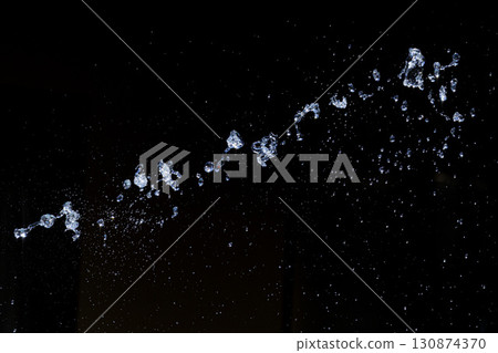 Slow motion image of the moment when the spray floats in the air Slow motion image of the moment when the spray floats in the air 130874370