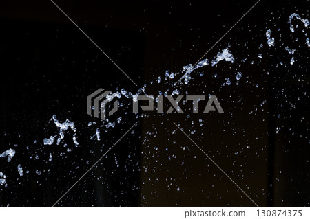 Slow motion image of the moment when the spray floats in the air Slow motion image of the moment when the spray floats in the air 130874375