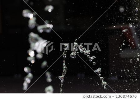 Slow motion image of the moment when the spray floats in the air Slow motion image of the moment when the spray floats in the air 130874676