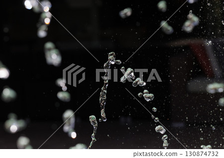 Slow motion image of the moment when the spray floats in the air 130874732