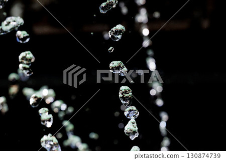 Slow motion image of the moment when the spray floats in the air Slow motion image of the moment when the spray floats in the air 130874739