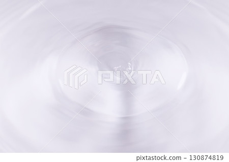 Drops of water falling on the surface of the water. Drops of water falling on the surface of the water. 130874819