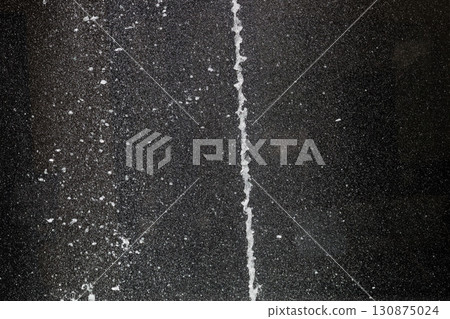 Slow motion image of the moment when the spray floats in the air 130875024