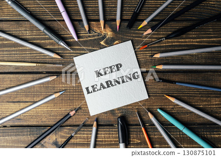 Collection of writing implements, including pens and pencils 130875101