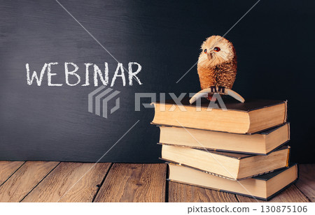 Chalkboard with the word webinar written on it Chalkboard with the word webinar written on it 130875106