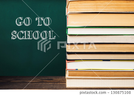 Stack of books with the words go to school Stack of books with the words go to school 130875108