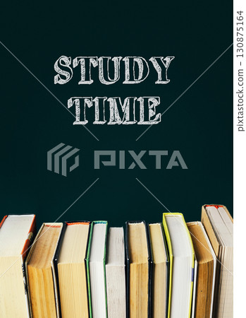 Stack of books with the words Study Time written above them Stack of books with the words Study Time written above them 130875164