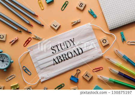 Concept of learning and productivity, as the mask is associated with studying Concept of learning and productivity, as the mask is associated with studying 130875197