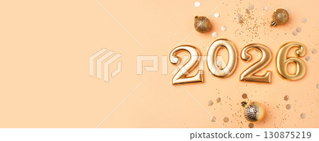 Golden 2026 on a peach color background with confetti and bokeh lights. Happy New Year 2025 is coming concept. Top view. 130875219