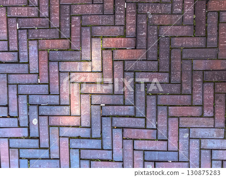 Brick wall with a zigzag pattern Brick wall with a zigzag pattern 130875283