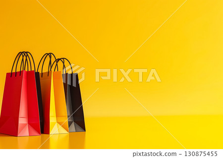 Yellow background with four shopping bags on it. 130875455