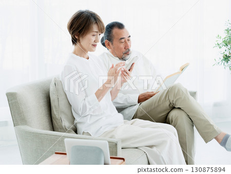 A senior couple using DX services 130875894