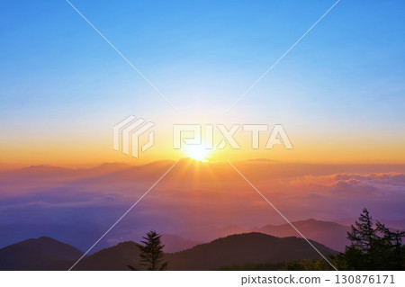 The sun at dawn from the Utsukushigahara Plateau in Nagano Prefecture The sun at dawn from the Utsukushigahara Plateau in Nagano Prefecture 130876171