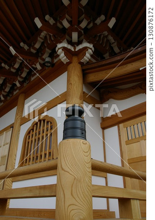 Japanese-style architectural timber and brackets supporting traditional Japanese shrine and temple eaves beams 1 Japanese-style architectural timber and brackets supporting traditional Japanese shrine and temple eaves beams 1 130876172