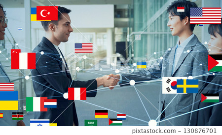Multinational people shaking hands and national flag image International network Multinational people shaking hands and national flag image International network 130876701