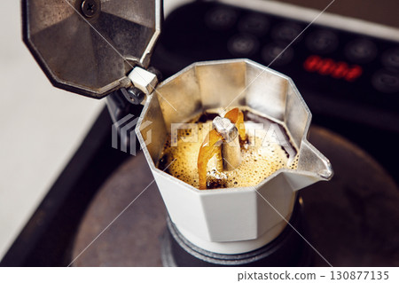 Brewing Espresso in Classic Moka Pot on Stovetop: Art of Percolation Brewing Espresso in Classic Moka Pot on Stovetop: Art of Percolation 130877135