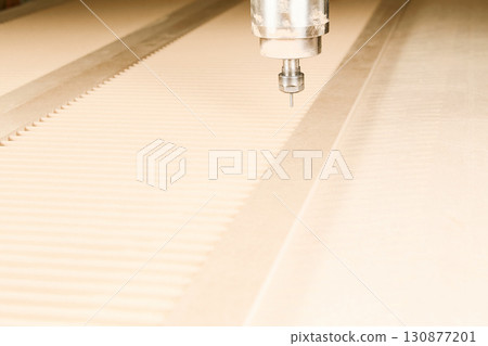 CNC milling machine. Machine tool in wood factory with drilling machines. 130877201