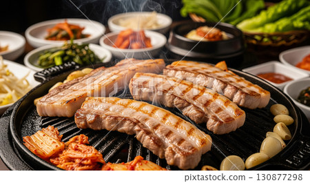 Grilled Korean Samgyeopsal Pork Belly with Garlic and Kimchi 130877298