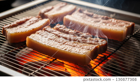 Korean Pork Belly Samgyeopsal Grilling over Charcoal Fire 130877308