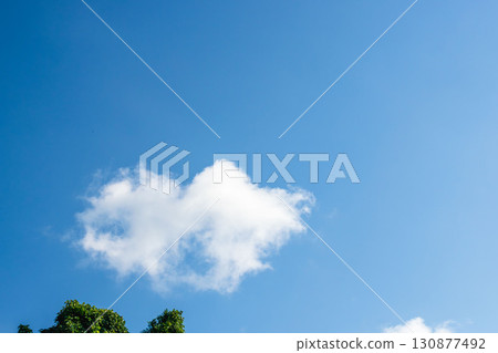 Summer blue sky and summer clouds shining in the sunlight 98 130877492