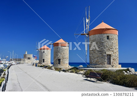 Rhodes windmills. Beautiful concept for travel and vacation in Greece. Rhodes windmills. Beautiful concept for travel and vacation in Greece. 130878211