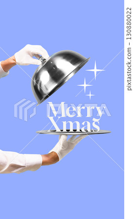 Trendy collage of Merry Xmas white typography with sparkles on tray held by gloved hand and blue background 130880022