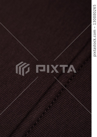 Dark brown fabric with a neat seam. Cotton. Dark brown fabric with a neat seam. Cotton. 130880265