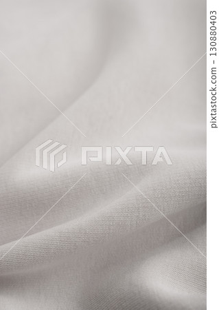 Gray textile texture. Thick premium fabric. Cotton. Gray textile texture. Thick premium fabric. Cotton. 130880403