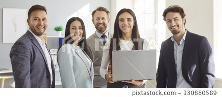 Group Portrait Of A Happy Business Team In Office Group Portrait Of A Happy Business Team In Office 130880589